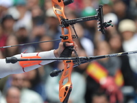 Matias Grande of Mexico competes against Marcus D'Almeida of Brazil (not in picture) during the Men's recurve 3rd place match on the final d...