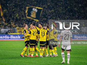 Players of Borussia Dortmund celebrate after scoring the first goal during the Bundesliga match between Borussia Dortmund and FC St. Pauli 1...