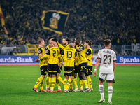 Players of Borussia Dortmund celebrate after scoring the first goal during the Bundesliga match between Borussia Dortmund and FC St. Pauli 1...