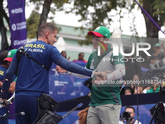 Marcus D'Almeida of Brazil and Matias Grande of Mexico compete during the Men's recurve 3rd place match on the final day of the Tlaxcala 202...