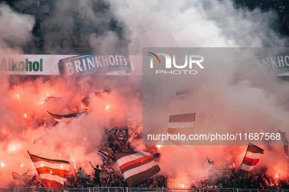 Fans of FC St. Pauli 1910 ignite pyro during the Bundesliga match between Borussia Dortmund and FC St. Pauli 1910 at Signal Iduna Park in Do...