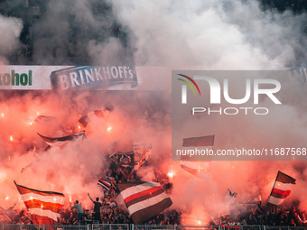 Fans of FC St. Pauli 1910 ignite pyro during the Bundesliga match between Borussia Dortmund and FC St. Pauli 1910 at Signal Iduna Park in Do...