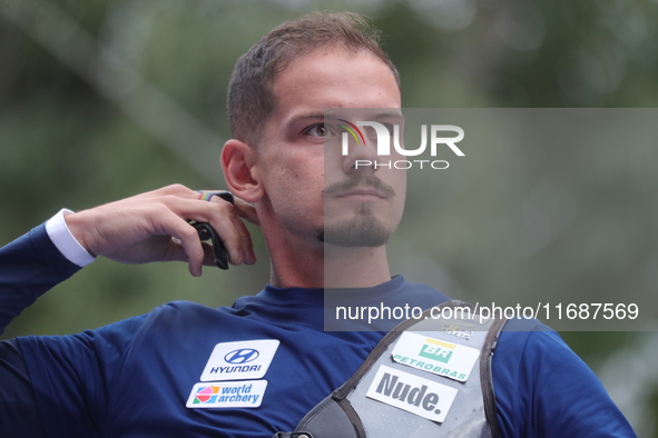 Marcus D'Almeida of Brazil competes against Matias Grande of Mexico (not in picture) during the Men's recurve 3rd place match on the final d...