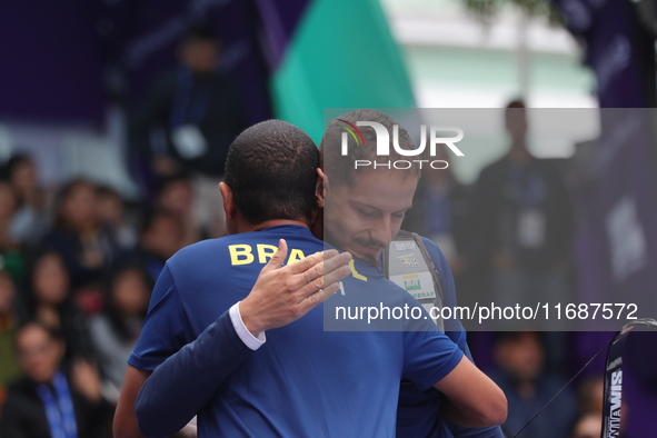 Marcus D'Almeida of Brazil competes against Matias Grande of Mexico (not in picture) during the Men's recurve 3rd place match on the final d...