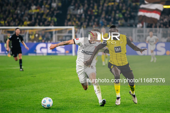 Serhou Guirassy of Borussia Dortmund fights for the ball during the Bundesliga match between Borussia Dortmund and FC St. Pauli 1910 at Sign...