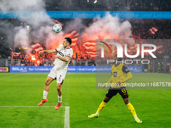 Jamie Bynoe-Gittens of Borussia Dortmund plays against Manolis Saliakas of FC St. Pauli during the Bundesliga match between Borussia Dortmun...