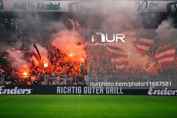 Fans of FC St. Pauli 1910 ignite pyro during the Bundesliga match between Borussia Dortmund and FC St. Pauli 1910 at Signal Iduna Park in Do...