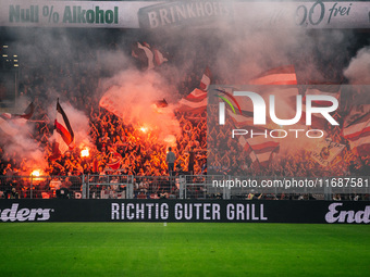 Fans of FC St. Pauli 1910 ignite pyro during the Bundesliga match between Borussia Dortmund and FC St. Pauli 1910 at Signal Iduna Park in Do...