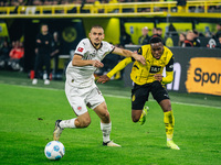 Jamie Bynoe-Gittens of Borussia Dortmund fights for the ball during the Bundesliga match between Borussia Dortmund and FC St. Pauli 1910 at...