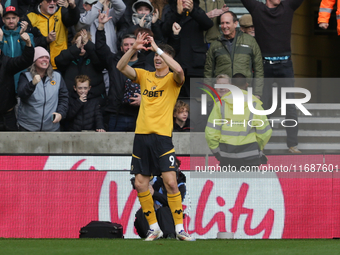 J?rgen Strand Larsen of Wolves celebrates after scoring their first goal during the Premier League match between Wolverhampton Wanderers and...