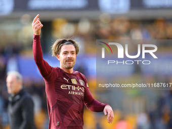 Jack Grealish of Manchester City salutes the fans after the Premier League match between Wolverhampton Wanderers and Manchester City at Moli...