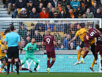 John Stones of Manchester City (5) scores his side's second goal during the Premier League match between Wolverhampton Wanderers and Manches...