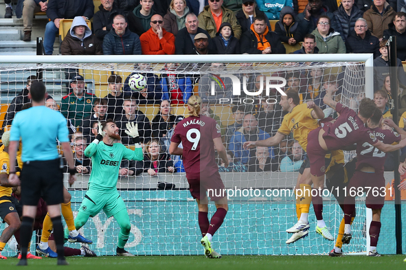 John Stones of Manchester City (5) scores his side's second goal during the Premier League match between Wolverhampton Wanderers and Manches...