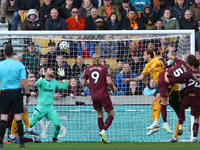 John Stones of Manchester City (5) scores his side's second goal during the Premier League match between Wolverhampton Wanderers and Manches...