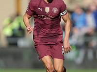 Ruben Dias of Manchester City participates in the Premier League match between Wolverhampton Wanderers and Manchester City at Molineux in Wo...