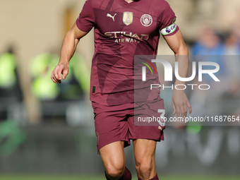 Ruben Dias of Manchester City participates in the Premier League match between Wolverhampton Wanderers and Manchester City at Molineux in Wo...