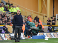 Manchester City's manager Pep Guardiola is present during the Premier League match between Wolverhampton Wanderers and Manchester City at Mo...