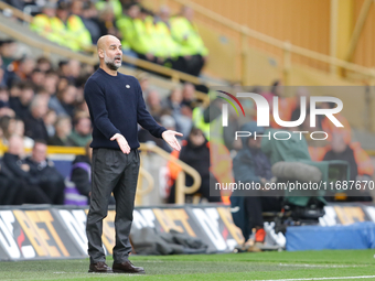 Manchester City's manager Pep Guardiola is present during the Premier League match between Wolverhampton Wanderers and Manchester City at Mo...