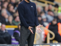 Manchester City's manager Pep Guardiola is present during the Premier League match between Wolverhampton Wanderers and Manchester City at Mo...