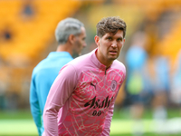 John Stones of Manchester City warms up during the Premier League match between Wolverhampton Wanderers and Manchester City at Molineux in W...