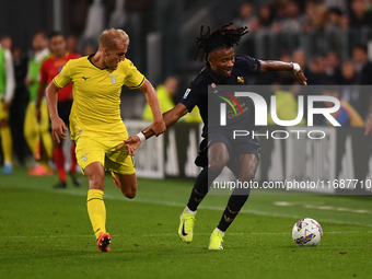 Lazio's Gustav Isaksen battles for the ball with Juventus' Khephren Thuram during the Serie A match between Juventus FC and SS Lazio at Alli...