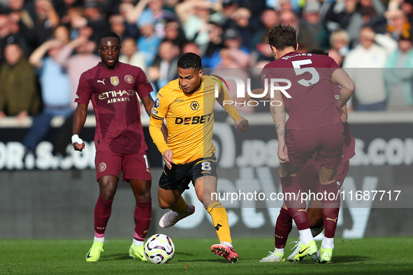 Jo?o Gomes of Wolves plays during the Premier League match between Wolverhampton Wanderers and Manchester City at Molineux in Wolverhampton,...