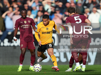 Jo?o Gomes of Wolves plays during the Premier League match between Wolverhampton Wanderers and Manchester City at Molineux in Wolverhampton,...