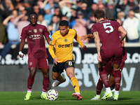 Jo?o Gomes of Wolves plays during the Premier League match between Wolverhampton Wanderers and Manchester City at Molineux in Wolverhampton,...