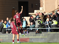 John Stones of Manchester City celebrates with Jack Grealish after scoring his side's second goal during the Premier League match between Wo...