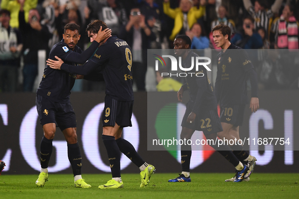 Danilo of Juventus celebrates with Dusan Vlahovic of Juventus during the Serie A match between Juventus FC and SS Lazio at Allianz Stadium i...