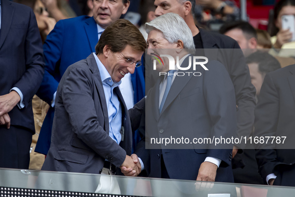 Jose Luis Martinez Almeida, mayor of Madrid, cheers Enrique Cerezo, president of Atletico de Madrid, during the La Liga EA Sports 2024/25 fo...