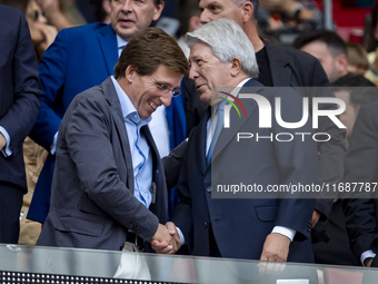 Jose Luis Martinez Almeida, mayor of Madrid, cheers Enrique Cerezo, president of Atletico de Madrid, during the La Liga EA Sports 2024/25 fo...