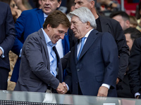 Jose Luis Martinez Almeida, mayor of Madrid, cheers Enrique Cerezo, president of Atletico de Madrid, during the La Liga EA Sports 2024/25 fo...