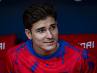 Julian Alvarez of Atletico de Madrid sits on the bench during the La Liga EA Sports 2024/25 football match between Atletico de Madrid and CD...