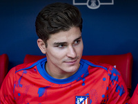 Julian Alvarez of Atletico de Madrid sits on the bench during the La Liga EA Sports 2024/25 football match between Atletico de Madrid and CD...