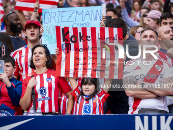 Fans of Atletico de Madrid are seen during the La Liga EA Sports 2024/25 football match between Atletico de Madrid and CD Leganes at Estadio...