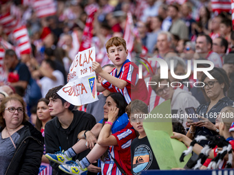 Fans of Atletico de Madrid are seen during the La Liga EA Sports 2024/25 football match between Atletico de Madrid and CD Leganes at Estadio...