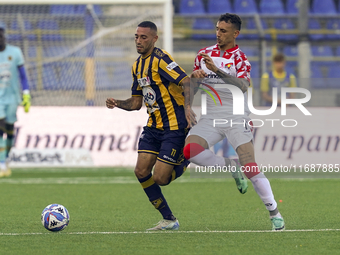 Kevin Piscopo of SS Juve Stabia competes for the ball with Michele Collocolo of Cremonese during the Serie B match between SS Juve Stabia an...