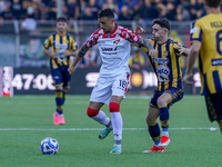 Michele Collocolo of Cremonese competes for the ball with Christian Pierobon of Cremonese during the Serie B match between SS Juve Stabia an...