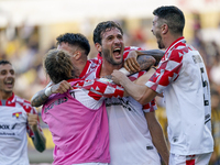 Franco Vazquez of Cremonese celebrates with team mates after scoring during the Serie B match between SS Juve Stabia and Cremonese at Stadio...