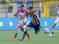 Yuri Rocchetti of SS Juve Stabia competes for the ball with Luca Zanimacchia of US Cremonese during the Serie B match between SS Juve Stabia...