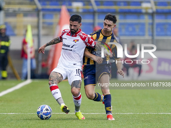 Cristian Buonaiuto of Cremonese competes for the ball with Christian Pierobon of Cremonese during the Serie B match between SS Juve Stabia a...