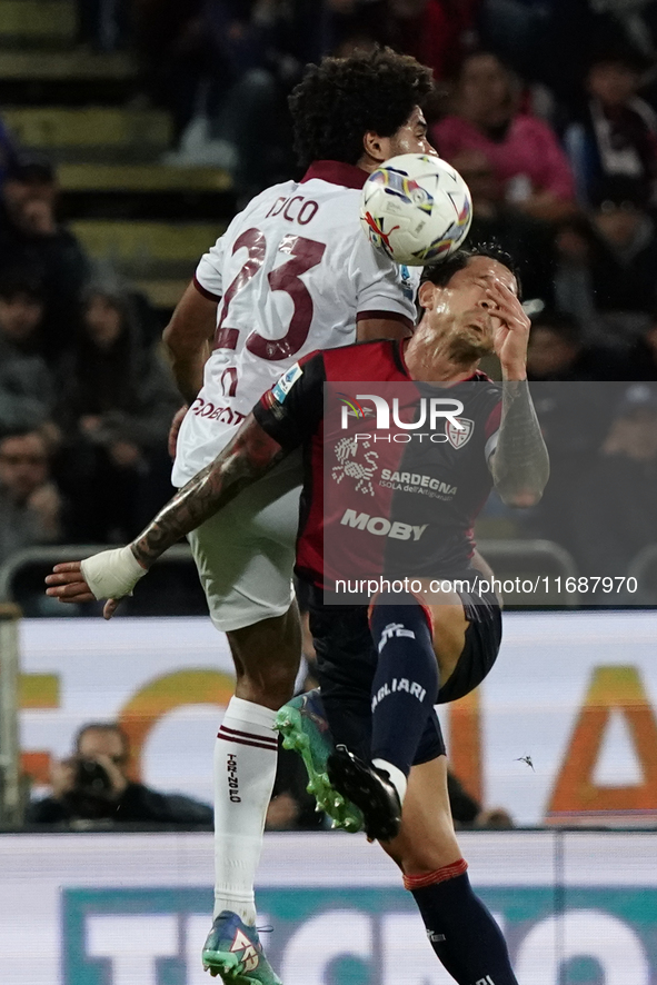 Saul Coco of Torino FC and Gianluca Lapadula of Cagliari Calcio (#9) during the Serie A TIM match between Cagliari Calcio and Torino FC in I...