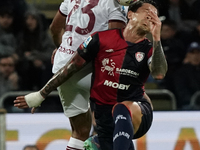 Saul Coco of Torino FC and Gianluca Lapadula of Cagliari Calcio (#9) during the Serie A TIM match between Cagliari Calcio and Torino FC in I...