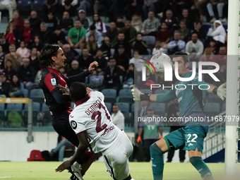 Ali Dembele (Torino FC), Simone Scuffet (#22 Cagliari Calcio), and Tommaso Augello (#27 Cagliari Calcio) participate in the Serie A TIM matc...