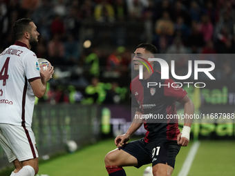 Sebastian Walukiewicz of Torino FC and Roberto Piccoli of Cagliari Calcio (#91) are present during the Serie A TIM match between Cagliari Ca...