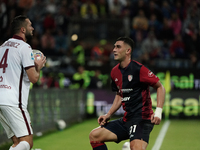 Sebastian Walukiewicz of Torino FC and Roberto Piccoli of Cagliari Calcio (#91) are present during the Serie A TIM match between Cagliari Ca...