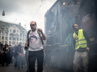 ADEV participants dance through the streets of Amsterdam, Netherlands, on October 19, 2024.  On Saturday, October 19, 2024, the ADEV (Amster...