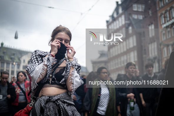 ADEV participants dance through the streets of Amsterdam, Netherlands, on October 19, 2024.  On Saturday, October 19, 2024, the ADEV (Amster...