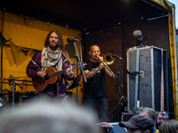 ADEV participants dance through the streets of Amsterdam, Netherlands, on October 19, 2024.  On Saturday, October 19, 2024, the ADEV (Amster...